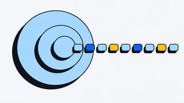 Three nested circles with a row of small colored blocks flowing out of the smallest.